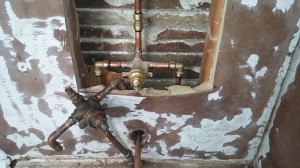Old Shower Valve next to New SIMMONS valve