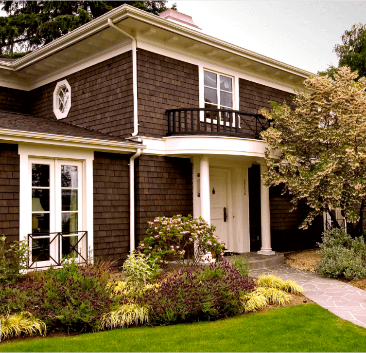 Brown Color Siding with White Trim