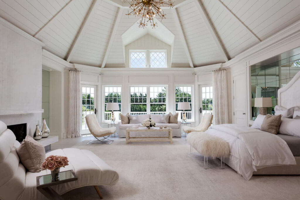 Country style master bedroom with trim