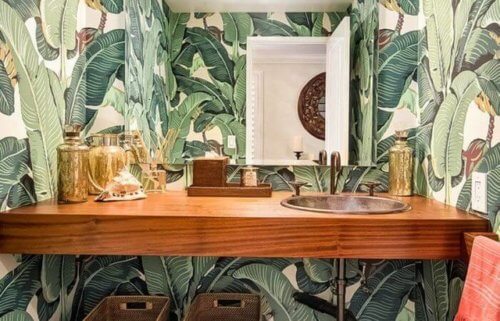 banana leaves wallpaper in a powder room 